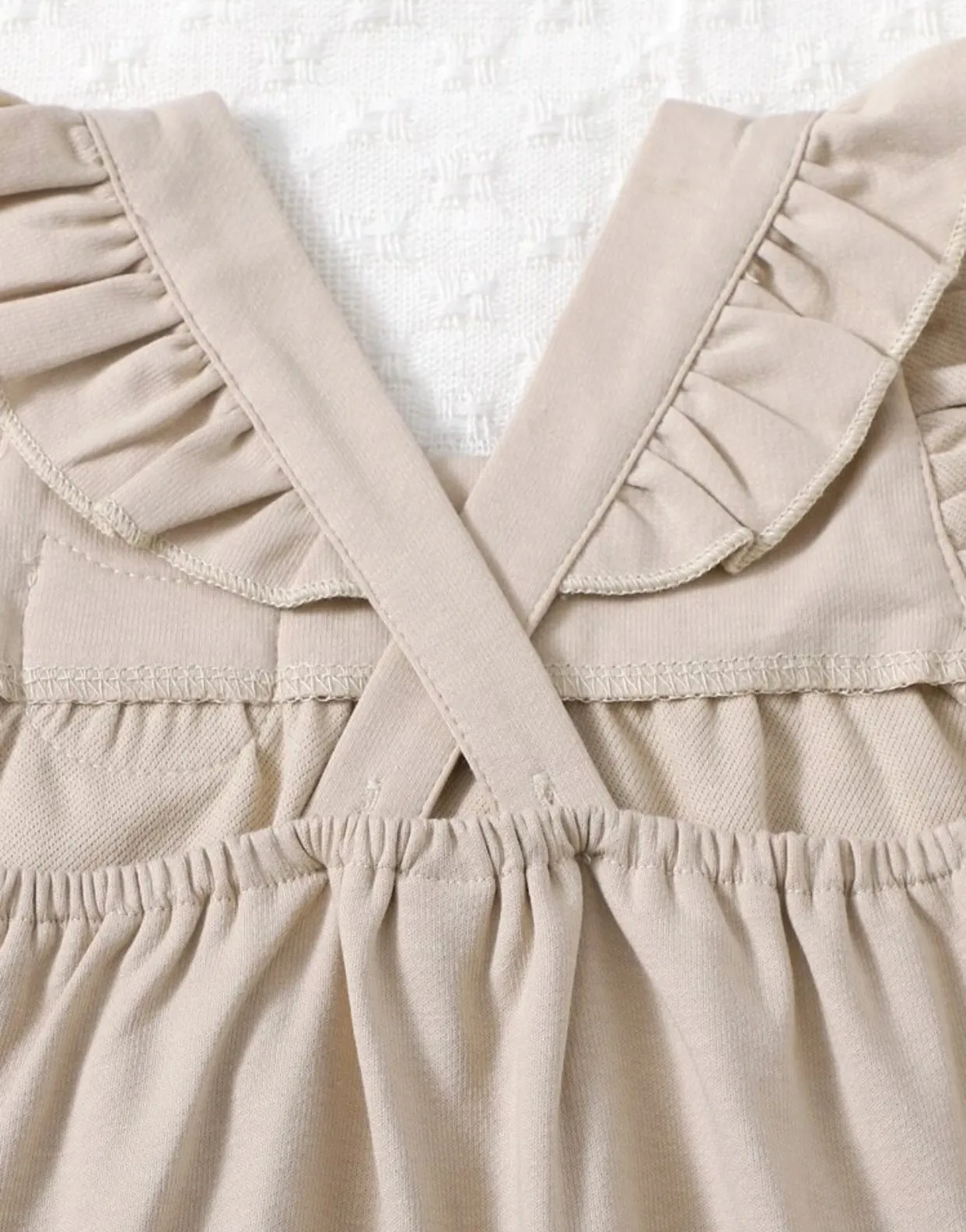 Khaki colored baby girl cartoon patched ruffle trim jumpsuit